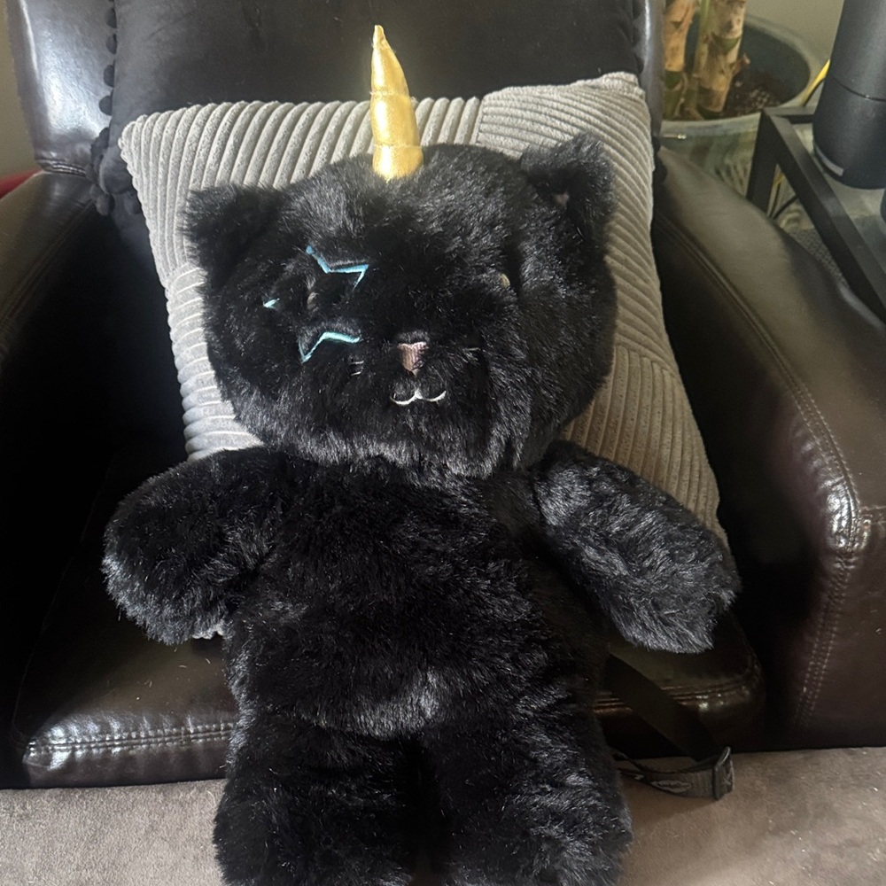 Betsey Johnson Black and Gold Unicorn Backpack